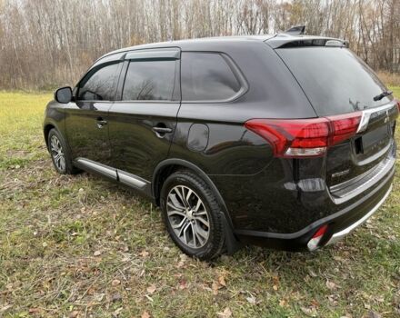 Черный Мицубиси Аутлендер, объемом двигателя 2.4 л и пробегом 130 тыс. км за 14950 $, фото 4 на Automoto.ua