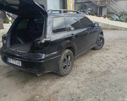 Чорний Міцубісі Аутлендер, об'ємом двигуна 2.4 л та пробігом 212 тис. км за 4800 $, фото 11 на Automoto.ua