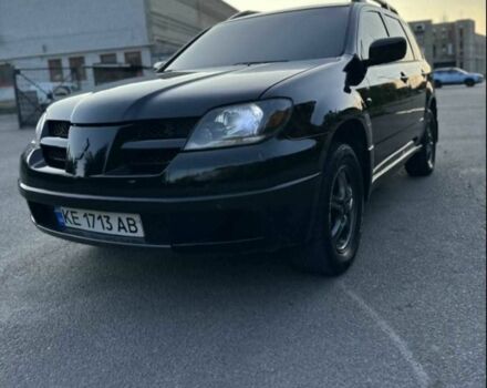 Чорний Міцубісі Аутлендер, об'ємом двигуна 2.4 л та пробігом 212 тис. км за 4800 $, фото 7 на Automoto.ua