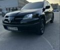 Чорний Міцубісі Аутлендер, об'ємом двигуна 2.4 л та пробігом 212 тис. км за 4800 $, фото 7 на Automoto.ua