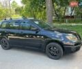 Черный Мицубиси Аутлендер, объемом двигателя 2.36 л и пробегом 130 тыс. км за 5400 $, фото 1 на Automoto.ua