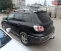 Черный Мицубиси Аутлендер, объемом двигателя 2 л и пробегом 250 тыс. км за 5200 $, фото 6 на Automoto.ua