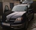 Чорний Міцубісі Аутлендер, об'ємом двигуна 2.38 л та пробігом 275 тис. км за 6000 $, фото 11 на Automoto.ua