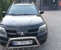 Чорний Міцубісі Аутлендер, об'ємом двигуна 2 л та пробігом 360 тис. км за 5400 $, фото 7 на Automoto.ua