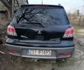 Черный Мицубиси Аутлендер, объемом двигателя 0 л и пробегом 200 тыс. км за 2300 $, фото 2 на Automoto.ua