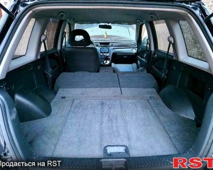 Чорний Міцубісі Аутлендер, об'ємом двигуна 2 л та пробігом 143 тис. км за 8500 $, фото 11 на Automoto.ua