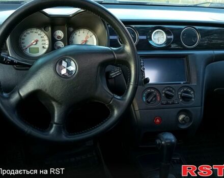 Мицубиси Аутлендер 2003 в Одессе на Automoto.ua Черный Мицубиси Аутлендер, объемом двигателя 2.4 л и пробегом 324 тыс. км за 6700 $, фото 3 на Automoto.ua