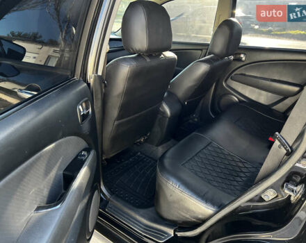 Черный Мицубиси Аутлендер, объемом двигателя 2.4 л и пробегом 267 тыс. км за 6900 $, фото 11 на Automoto.ua