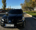 Черный Мицубиси Аутлендер, объемом двигателя 2.4 л и пробегом 267 тыс. км за 6900 $, фото 1 на Automoto.ua