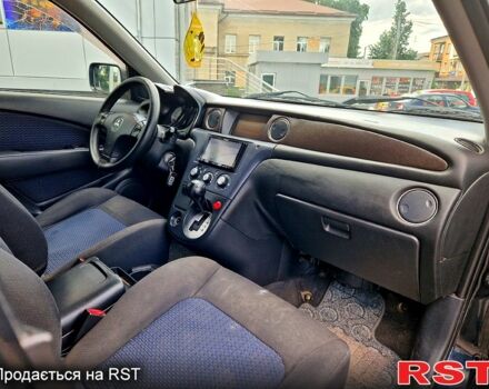 Чорний Міцубісі Аутлендер, об'ємом двигуна 2 л та пробігом 143 тис. км за 8500 $, фото 5 на Automoto.ua