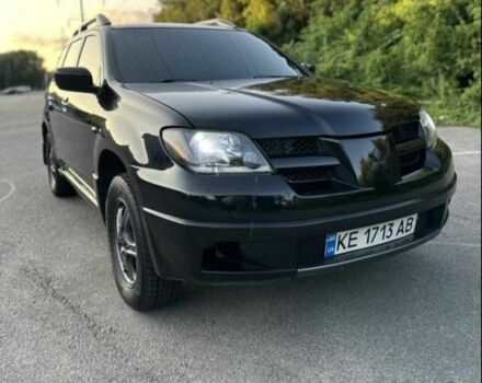 Чорний Міцубісі Аутлендер, об'ємом двигуна 2.4 л та пробігом 212 тис. км за 4800 $, фото 6 на Automoto.ua