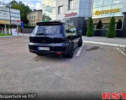 Чорний Міцубісі Аутлендер, об'ємом двигуна 2 л та пробігом 143 тис. км за 8500 $, фото 1 на Automoto.ua