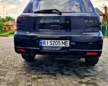 Чорний Міцубісі Аутлендер, об'ємом двигуна 2 л та пробігом 143 тис. км за 8500 $, фото 3 на Automoto.ua