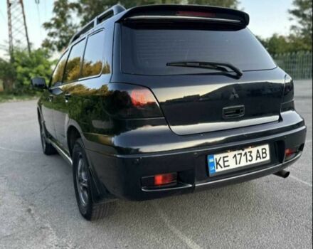 Чорний Міцубісі Аутлендер, об'ємом двигуна 2.4 л та пробігом 212 тис. км за 4800 $, фото 8 на Automoto.ua