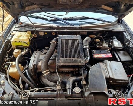 Чорний Міцубісі Аутлендер, об'ємом двигуна 2 л та пробігом 143 тис. км за 8500 $, фото 9 на Automoto.ua