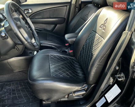 Черный Мицубиси Аутлендер, объемом двигателя 2.4 л и пробегом 267 тыс. км за 6900 $, фото 12 на Automoto.ua