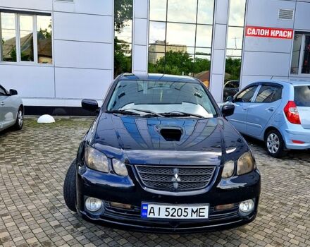 Чорний Міцубісі Аутлендер, об'ємом двигуна 2 л та пробігом 143 тис. км за 8500 $, фото 2 на Automoto.ua