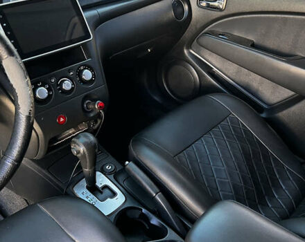 Черный Мицубиси Аутлендер, объемом двигателя 2.4 л и пробегом 267 тыс. км за 6900 $, фото 14 на Automoto.ua