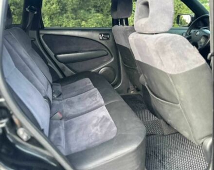 Чорний Міцубісі Аутлендер, об'ємом двигуна 2.4 л та пробігом 212 тис. км за 4800 $, фото 10 на Automoto.ua