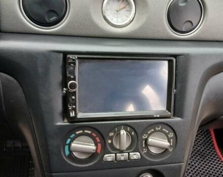 Черный Мицубиси Аутлендер, объемом двигателя 2 л и пробегом 395 тыс. км за 5200 $, фото 13 на Automoto.ua