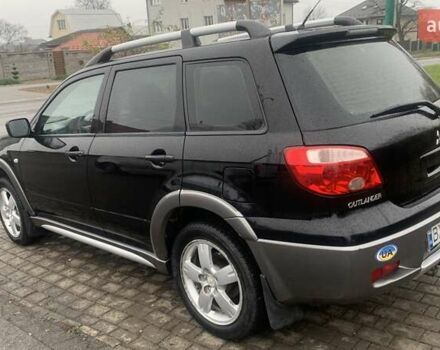 Черный Мицубиси Аутлендер, объемом двигателя 2 л и пробегом 300 тыс. км за 6500 $, фото 6 на Automoto.ua