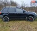 Черный Мицубиси Аутлендер, объемом двигателя 2 л и пробегом 395 тыс. км за 5200 $, фото 17 на Automoto.ua