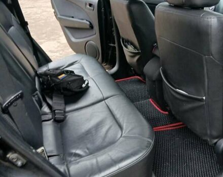 Черный Мицубиси Аутлендер, объемом двигателя 2 л и пробегом 395 тыс. км за 5200 $, фото 6 на Automoto.ua