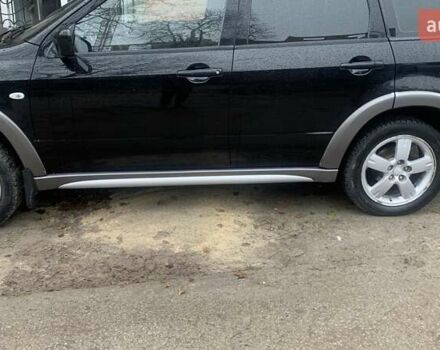 Черный Мицубиси Аутлендер, объемом двигателя 2 л и пробегом 300 тыс. км за 6500 $, фото 15 на Automoto.ua