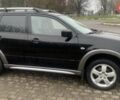 Черный Мицубиси Аутлендер, объемом двигателя 2 л и пробегом 300 тыс. км за 6500 $, фото 3 на Automoto.ua