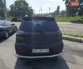 Черный Мицубиси Аутлендер, объемом двигателя 2 л и пробегом 174 тыс. км за 4400 $, фото 1 на Automoto.ua