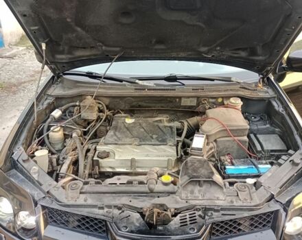 Черный Мицубиси Аутлендер, объемом двигателя 2.4 л и пробегом 243 тыс. км за 1846 $, фото 9 на Automoto.ua