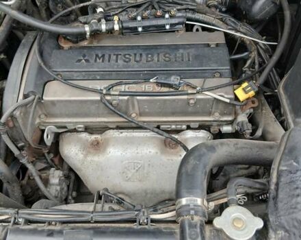 Черный Мицубиси Аутлендер, объемом двигателя 2 л и пробегом 395 тыс. км за 5200 $, фото 12 на Automoto.ua