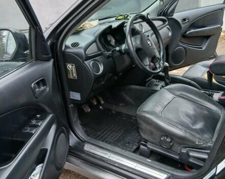 Черный Мицубиси Аутлендер, объемом двигателя 2 л и пробегом 395 тыс. км за 5200 $, фото 5 на Automoto.ua