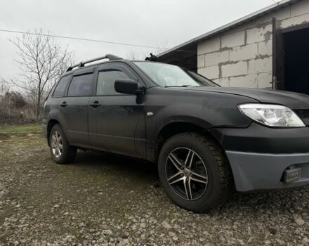 Черный Мицубиси Аутлендер, объемом двигателя 2.4 л и пробегом 3 тыс. км за 5208 $, фото 4 на Automoto.ua