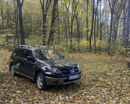 Чорний Міцубісі Аутлендер, об'ємом двигуна 2 л та пробігом 280 тис. км за 5701 $, фото 3 на Automoto.ua