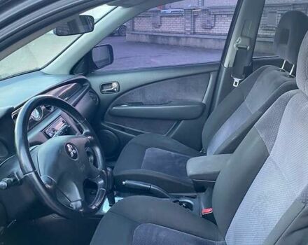 Чорний Міцубісі Аутлендер, об'ємом двигуна 2.38 л та пробігом 294 тис. км за 4550 $, фото 6 на Automoto.ua