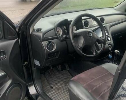 Черный Мицубиси Аутлендер, объемом двигателя 2 л и пробегом 300 тыс. км за 6500 $, фото 10 на Automoto.ua