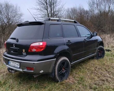 Черный Мицубиси Аутлендер, объемом двигателя 2 л и пробегом 395 тыс. км за 5200 $, фото 14 на Automoto.ua