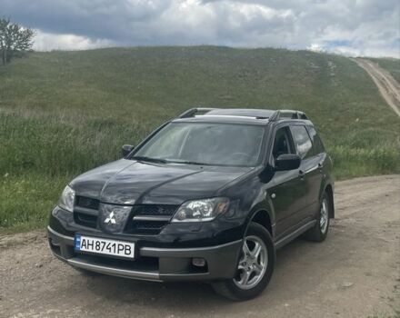 Чорний Міцубісі Аутлендер, об'ємом двигуна 2 л та пробігом 280 тис. км за 5701 $, фото 7 на Automoto.ua