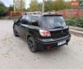 Черный Мицубиси Аутлендер, объемом двигателя 2.38 л и пробегом 293 тыс. км за 4999 $, фото 9 на Automoto.ua