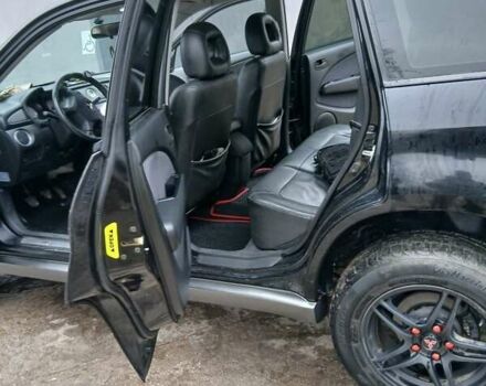 Черный Мицубиси Аутлендер, объемом двигателя 2 л и пробегом 395 тыс. км за 5200 $, фото 3 на Automoto.ua