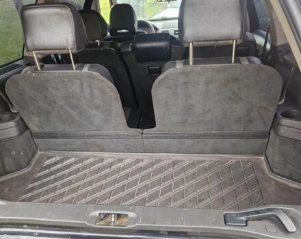 Черный Мицубиси Аутлендер, объемом двигателя 2 л и пробегом 302 тыс. км за 5333 $, фото 6 на Automoto.ua