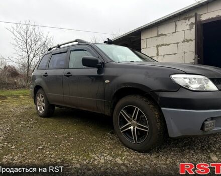 Черный Мицубиси Аутлендер, объемом двигателя 2.4 л и пробегом 357 тыс. км за 5190 $, фото 6 на Automoto.ua