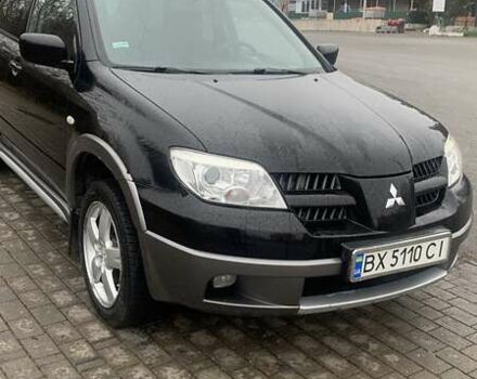 Черный Мицубиси Аутлендер, объемом двигателя 2 л и пробегом 300 тыс. км за 6500 $, фото 8 на Automoto.ua