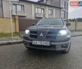 Черный Мицубиси Аутлендер, объемом двигателя 2.38 л и пробегом 340 тыс. км за 4650 $, фото 9 на Automoto.ua