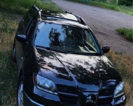 Чорний Міцубісі Аутлендер, об'ємом двигуна 2 л та пробігом 280 тис. км за 5701 $, фото 2 на Automoto.ua