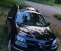 Чорний Міцубісі Аутлендер, об'ємом двигуна 2 л та пробігом 280 тис. км за 5701 $, фото 2 на Automoto.ua