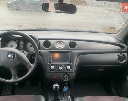 Черный Мицубиси Аутлендер, объемом двигателя 2 л и пробегом 300 тыс. км за 6500 $, фото 5 на Automoto.ua