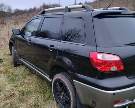 Черный Мицубиси Аутлендер, объемом двигателя 2 л и пробегом 395 тыс. км за 5200 $, фото 15 на Automoto.ua