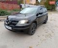 Черный Мицубиси Аутлендер, объемом двигателя 2.38 л и пробегом 293 тыс. км за 4999 $, фото 5 на Automoto.ua